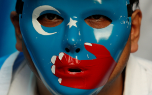 A Chinese Uyghur Muslim participates in an anti-China protest during the G20 leaders summit in Osaka, Japan June 28, 2019. REUTERS/Jorge Silva     TPX IMAGES OF THE DAY