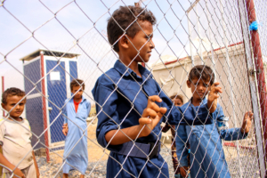 Yemenis displaced from an area near the Saudi border are pictured in a makeshift camp in the country's northern Hajjah