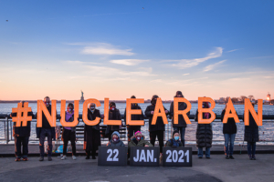 Activists from New York-based direct action group Rise and Resist and the International Campaign to Abolish Nuclear Weapons (ICAN) took to the streets to announce the entry into force of the Treaty on the Prohibition of Nuclear Weapons on January 22, 2021 by holding illuminated letters that read #NUCLEARBAN in front of iconic New York landscapes.