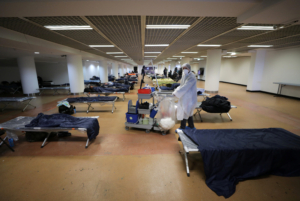 Homeless people sleep inside the Festival palace as Cannes Mayor David Lisnard decided to open a part of the palace to welcome needy and homeless as a lockdown is imposed to slow the rate of the coronavirus disease (COVID-19) in France, March 24, 2020.
