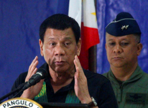 Philippine President Rodrigo Duterte speaks before soldiers during a visit at a military camp in Awang, Maguindanao in southern Philippines January 27, 2017.