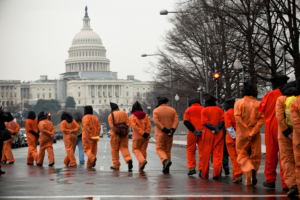 Amnesty International USA activists protest the 10th anniversary of the Guantanamo Bay detention centre, Washington DC, USA, 11 January 2012.