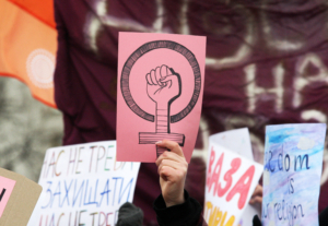 A woman holds a placard with a symbol of feminism during the feminist's Women March which is dedicated to International Women's Day in downtown Kiev.
Feminists, LGBT representatives, and human rights activists marched on International Women's Day (IWD) protesting against sexism and violence against women, demanding to the Ukrainian authorities to ratify the Istanbul Convention. (Photo by Pavlo Gonchar / SOPA Images/Sipa USA)No Use Germany.