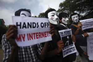 Protesters from the Anonymous India group of hackers wear Guy Fawkes masks as they protest against laws they say gives the government control over censorship of internet usage in Mumbai, June 9, 2012. Anonymous India is associated with the internationa hacker group Anonymous whose previous targets have included high profile targets. REUTERS/Vivek Prakash