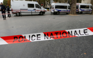Red and white tape used by the French national police secures a zone from traffic in Paris, France, October 19, 2016. French police officers staged a second night of protests overnight and booed their boss to decry anti-police violence and what they say are insufficient resources to combat criminal gangs as well as the threat of further terrorist attacks.  REUTERS/Regis Duvignau