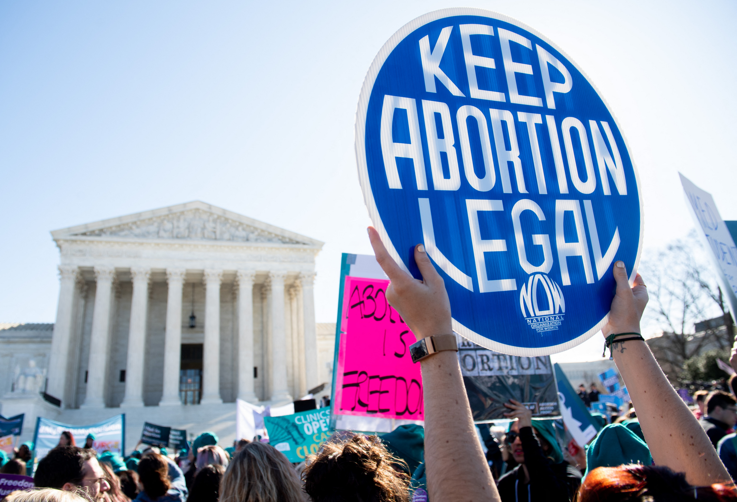 Pro-choice activists supporting legal access to abortion protest during a demonstration outside the US Supreme Court in Washington, DC, March 4, 2020, as the Court hears oral arguments regarding a Louisiana law about abortion access in the first major abortion case in years. - The United States Supreme Court on Wednesday will hear what may be its most significant case in decades on the controversial subject of abortion. At issue is a state law in Louisiana which requires doctors who perform abortions to have admitting privileges at a nearby hospital. (Photo by SAUL LOEB / AFP)