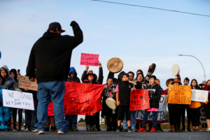 Supporters of the indigenous Wet'suwet'en Nation's hereditary chiefs block the Pat Bay highway as part of protests against the Coastal GasLink pipeline, in Victoria, British Columbia, Canada February 26, 2020.  REUTERS/Kevin Light