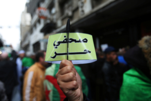 Algerian journalists demonstrate for freedom of the press during a protest against the country's ruling elite and rejecting the December presidential election in Algiers, Algeria November 15, 2019. The armband reads "Free journalist." REUTERS/Ramzi Boudina