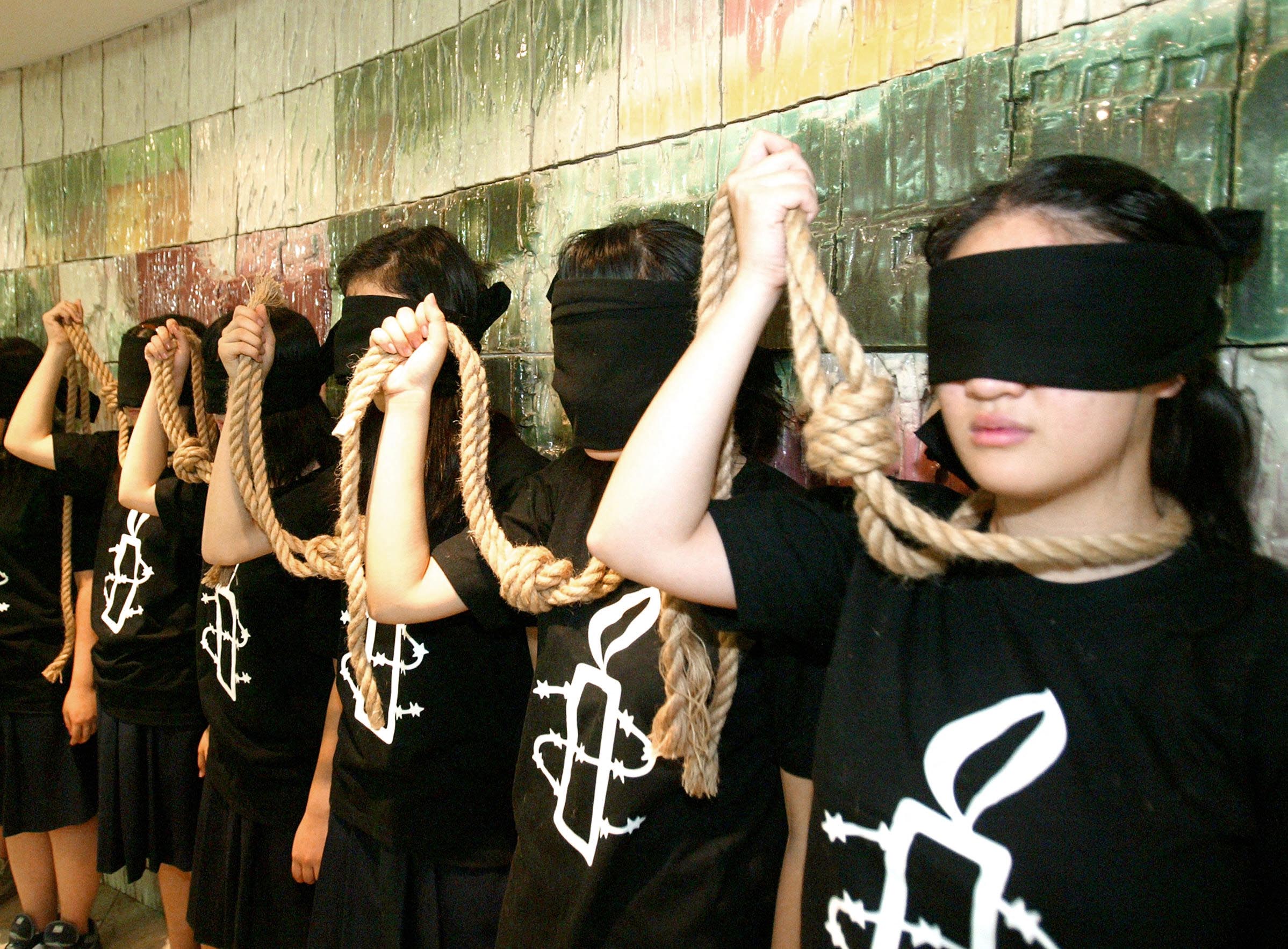 Des militants d'Amnesty International Corée du Sud manifestent contre la peine capitale à Séoul, le 10 ostobre 2007.