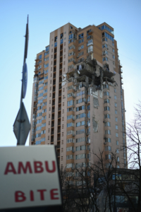 Damage to a building is seen after a rocket strike on an apartment building in Kyiv, Ukraine on Feb. 26, 2022. The strike happened in the early hours of the morning on Feb. 26, 2022 with an unknown number of dead and injured. Russia continued its offensive into Ukraine during the night with rocket attacks and deployment of ground troops in multiple areas. (Photo by Justin Yau/Sipa USA)No Use Germany.